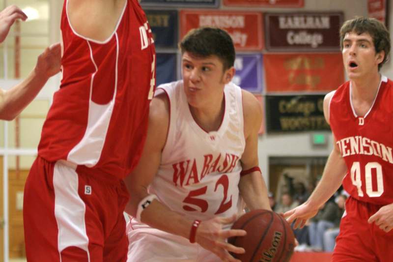 a basketball player in a red uniform