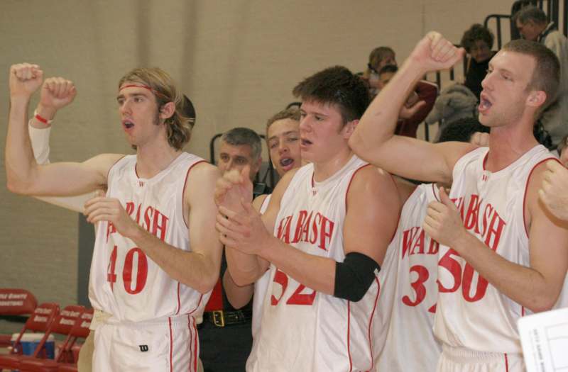 a group of men in basketball uniforms