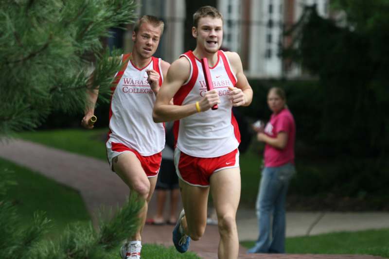 two men running in a race