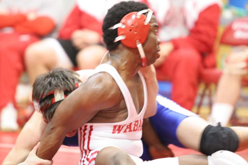 a group of people wrestling