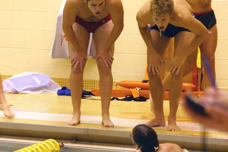 a group of men in swimsuits