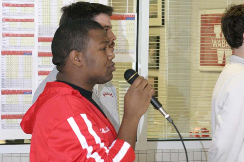 a man holding a microphone