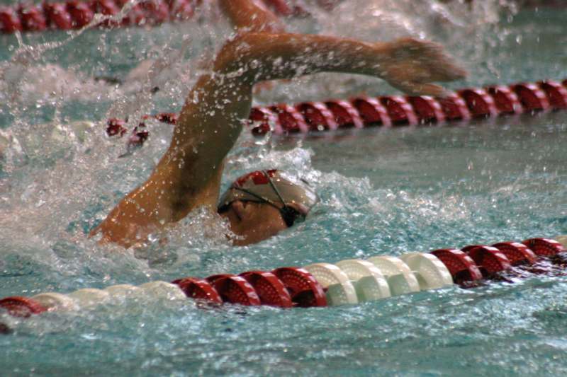 a person swimming in a pool
