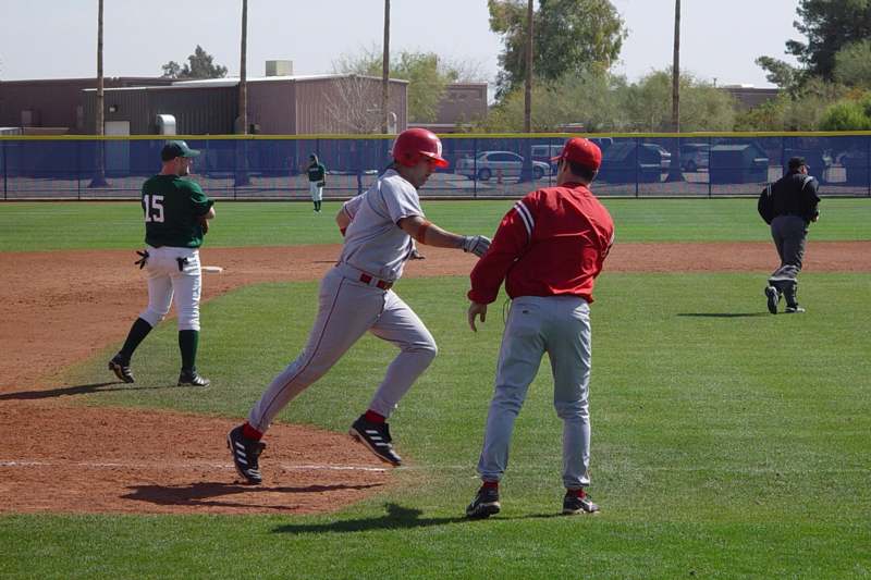 a baseball player running to first base