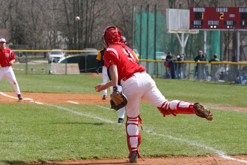 a baseball player throwing a ball