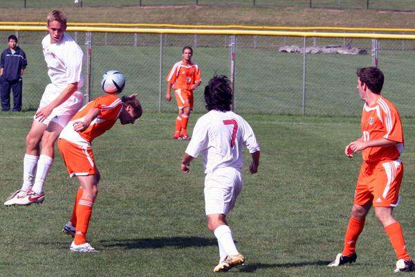 a group of men playing football