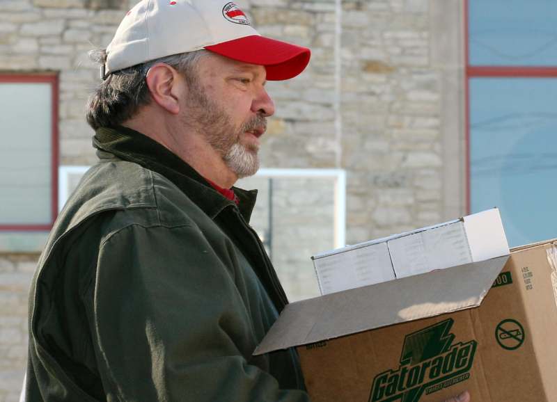 a man holding a box