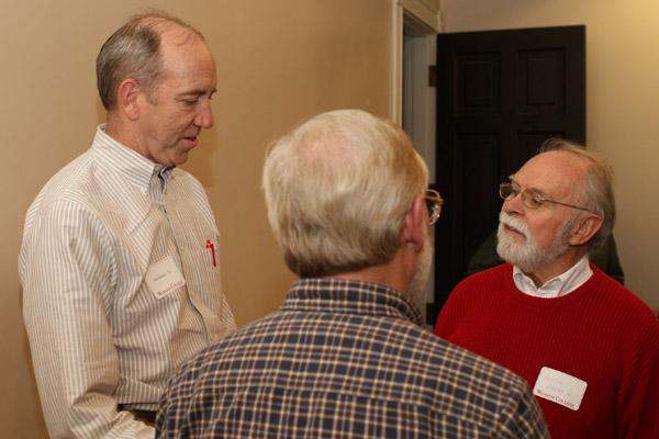 a group of men talking