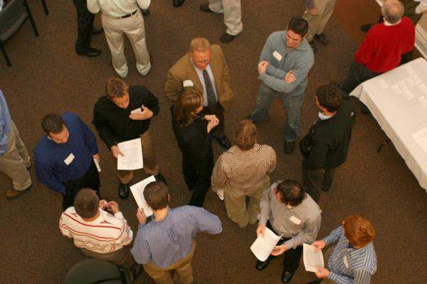a group of people standing in a circle
