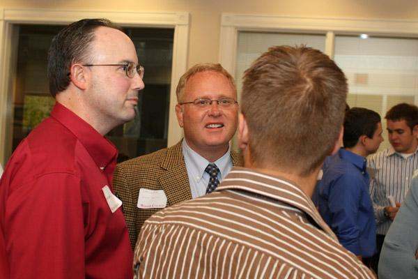 a group of men talking