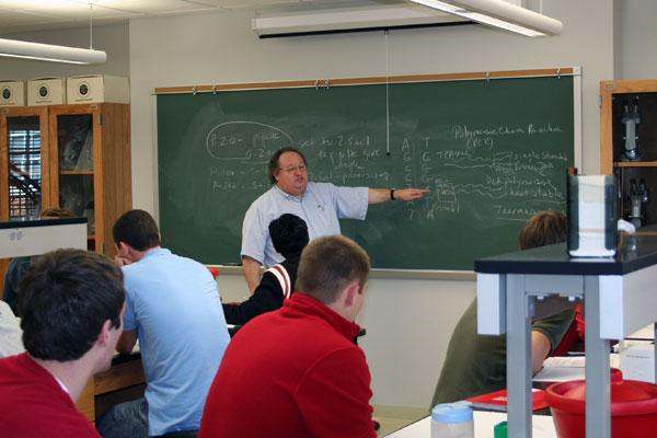 a man teaching in a classroom