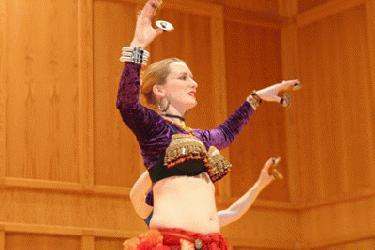 a woman performing belly dance