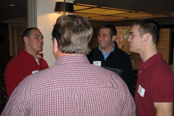 a group of men talking