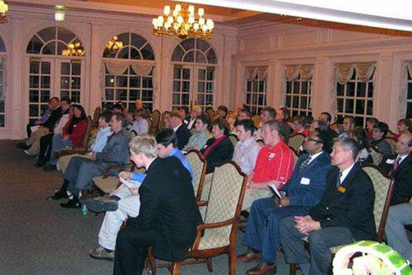 a group of people sitting in chairs