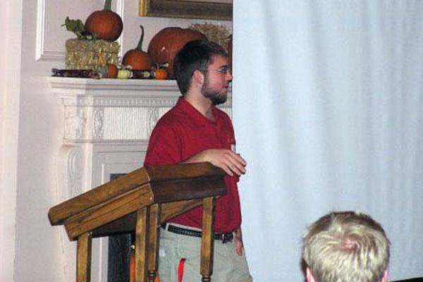 a man standing at a podium