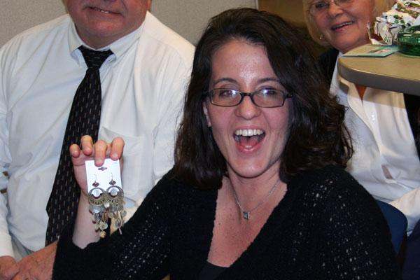 a woman holding a key