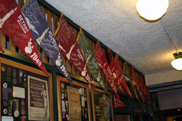 a row of flags from a wall