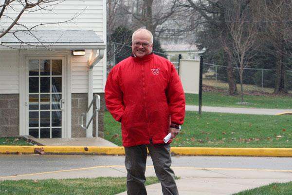 a man in a red jacket