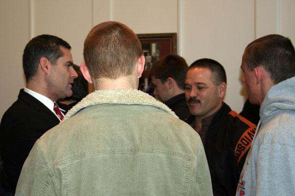 a group of men talking