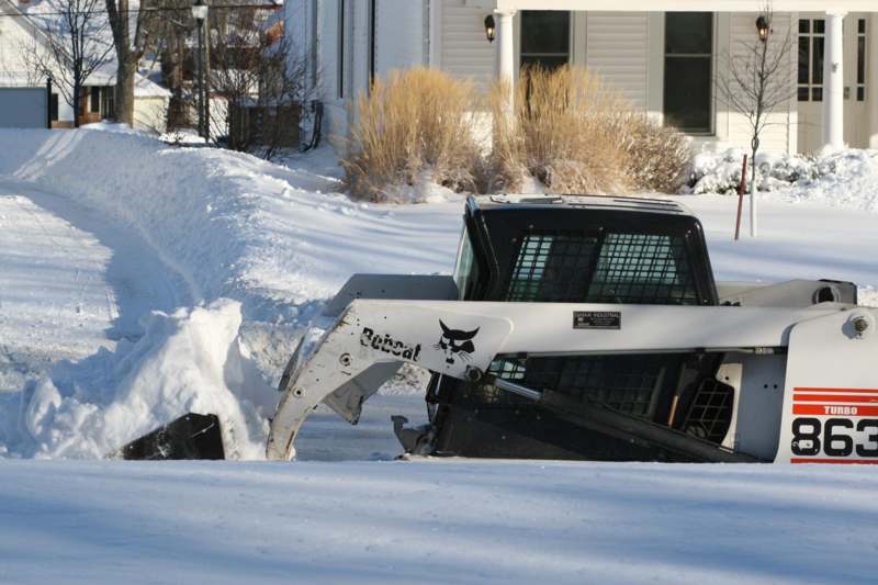 a bulldozer in the snow