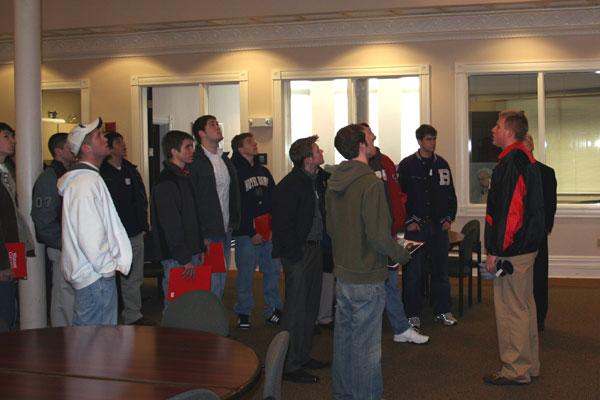 a man standing in front of a group of people