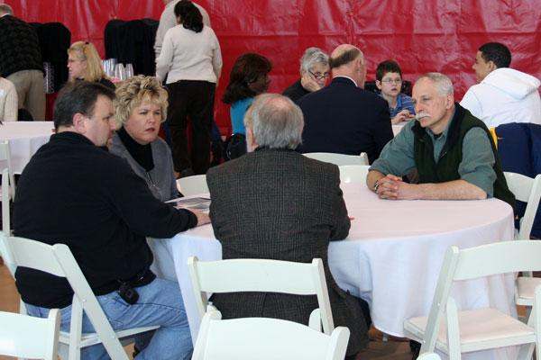 a group of people sitting at a table