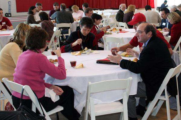 a group of people eating at a table
