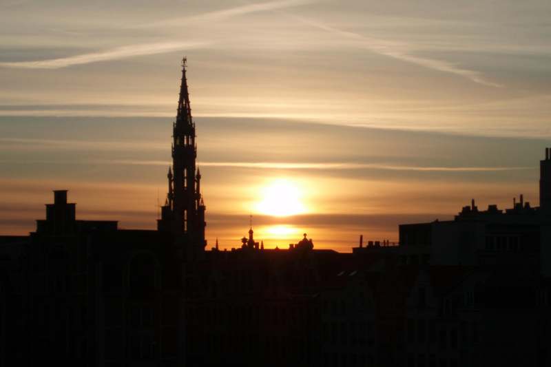 a silhouette of a building with a spire