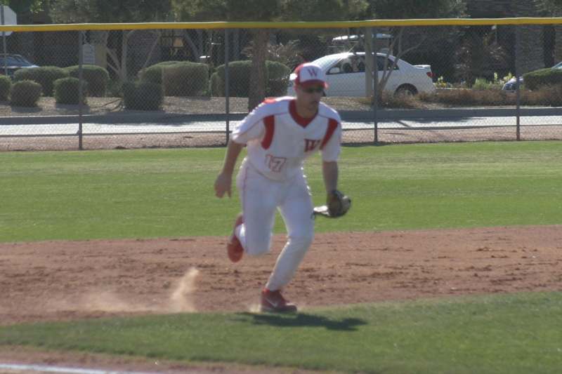 a baseball player running on a field