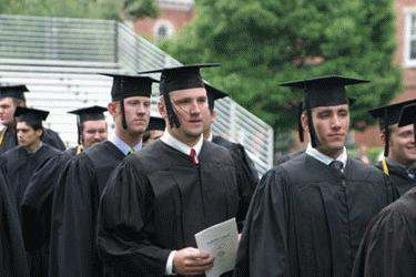 a group of graduates in black gowns
