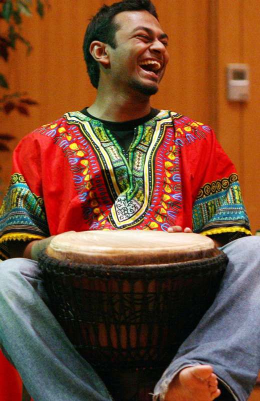 a man playing a drum