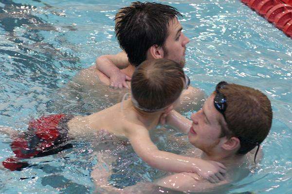 a group of people in a pool