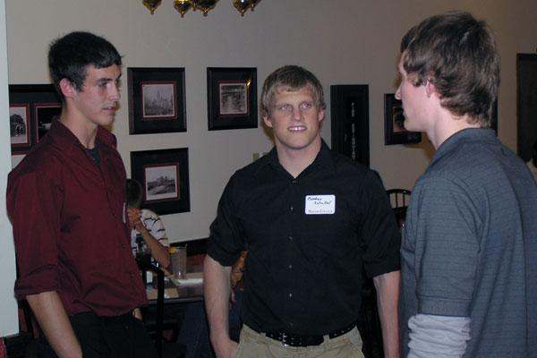 a group of men talking