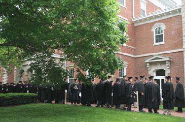 a group of graduates outside a building