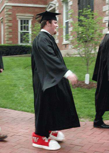 a man in a black robe