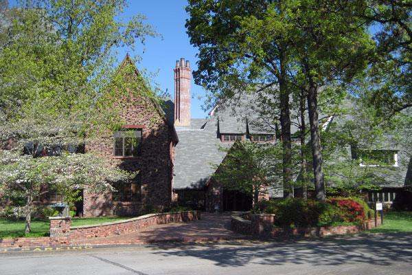 a house with trees and bushes