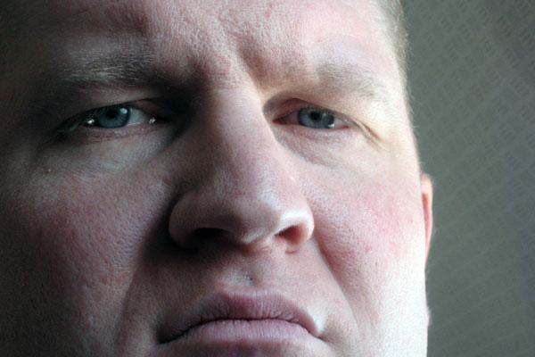 a close up of a man's face