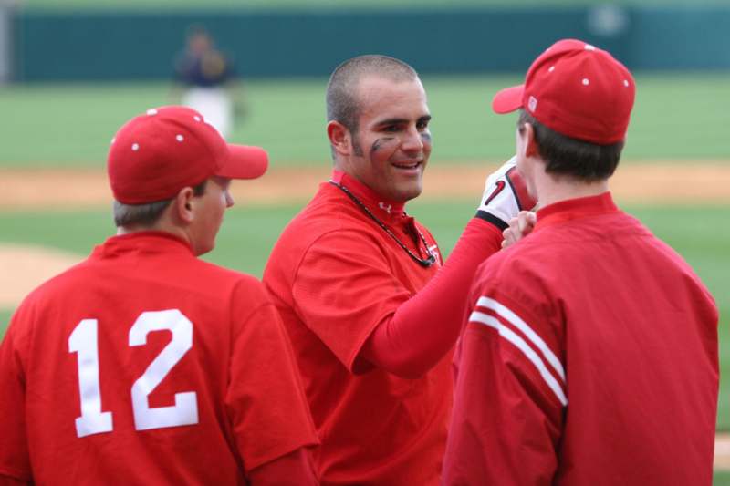 a baseball coach with his team