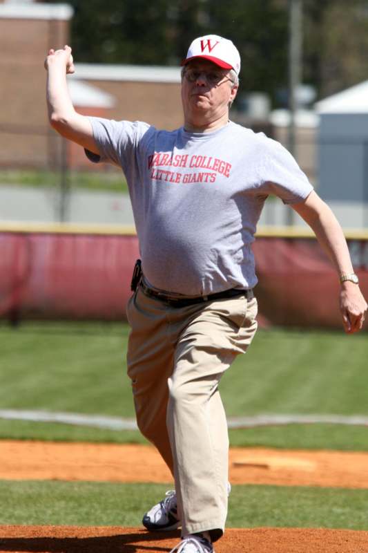 a man throwing a baseball