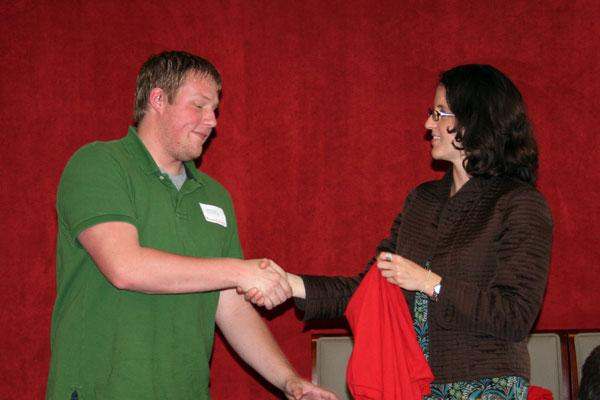 a man and woman shaking hands