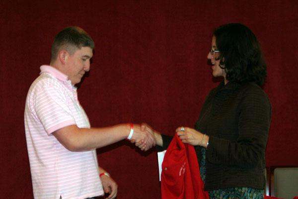 a man and woman shaking hands