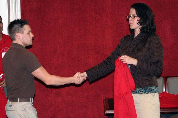 a man and woman shaking hands