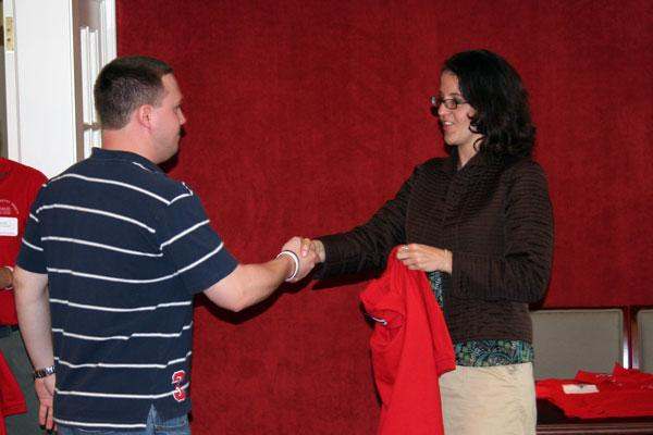 a man and woman shaking hands