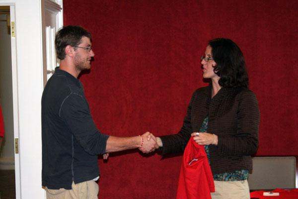 a man and woman shaking hands