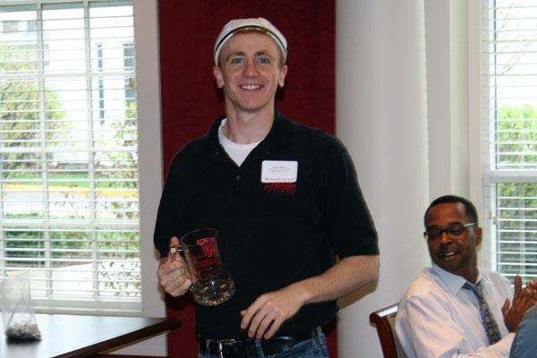 a man holding a glass