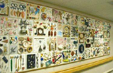 a wall with many objects on it