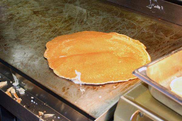 a pancake on a pancake maker