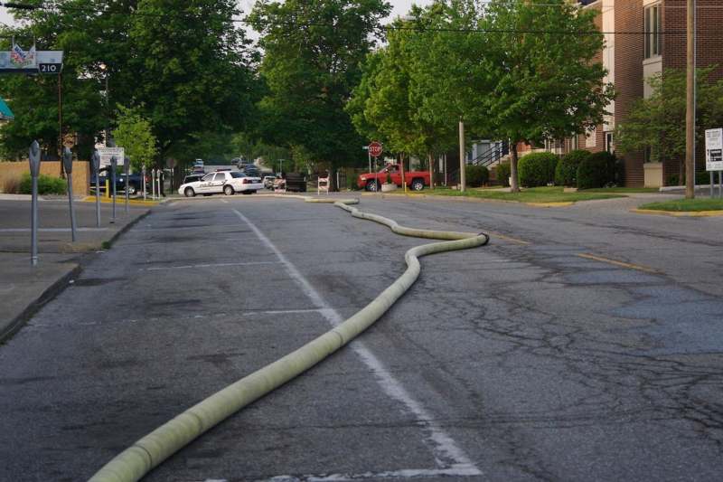 a fire hose on the street
