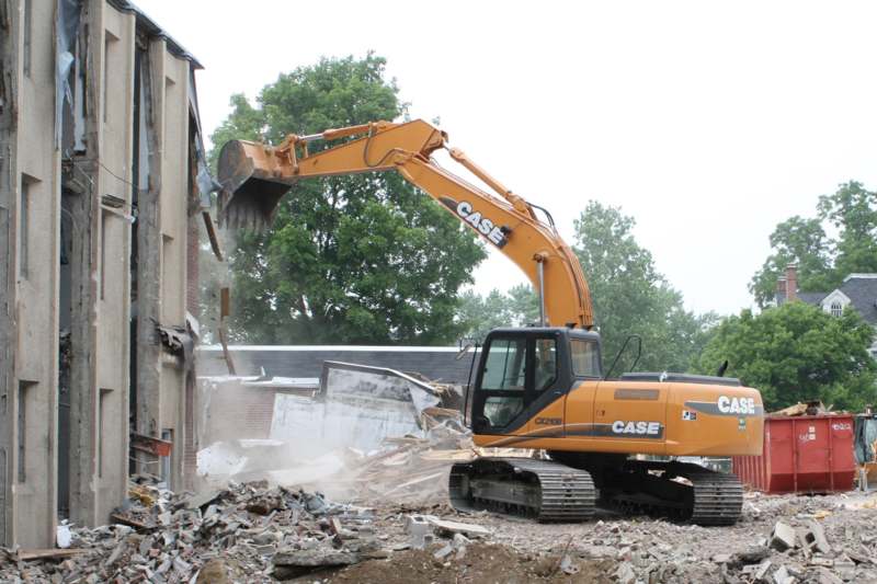 a construction vehicle being demolished
