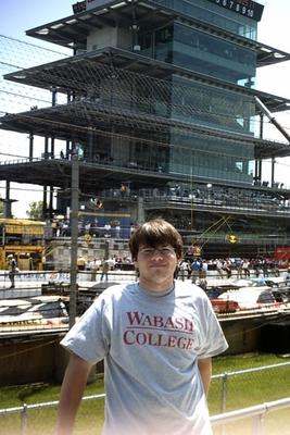 a man standing in front of a building